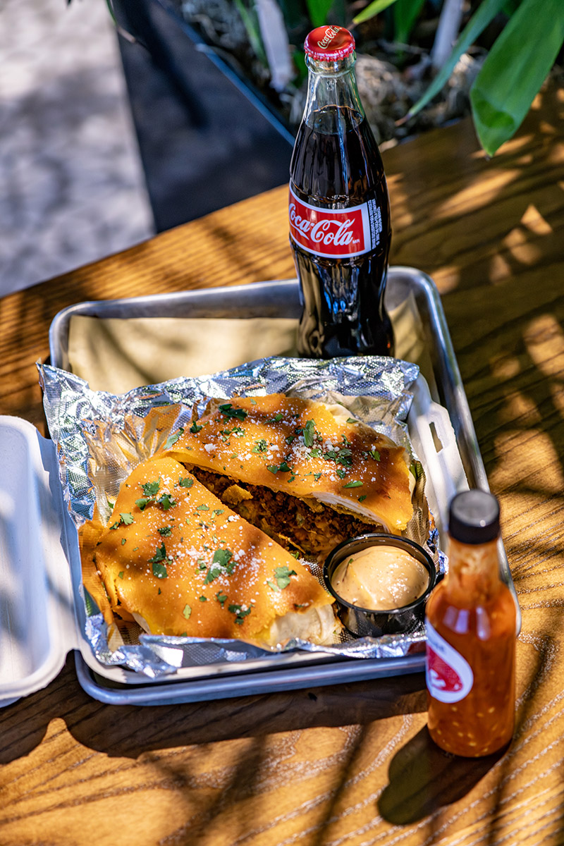 Golden Juntos quesadilla served with sides